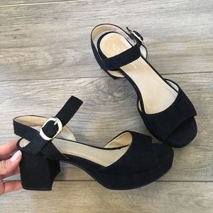 Black sandals from CL by Laundray